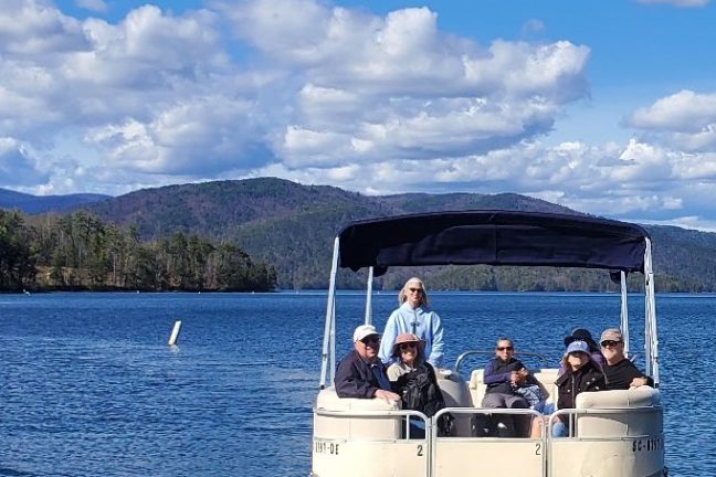a small boat in a large body of water