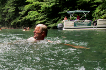 a group of people swimming in a body of water