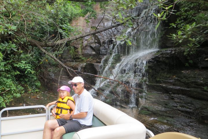 a man and a woman sitting on a bench