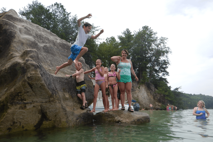 a man and woman swimming in the water