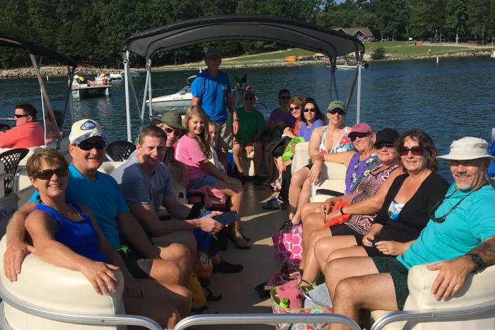 a group of people around each other