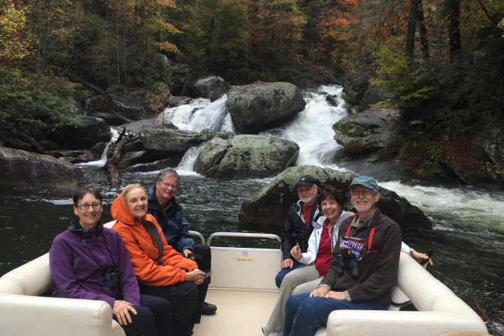 Jeremy Burgess et al. sitting on a bench