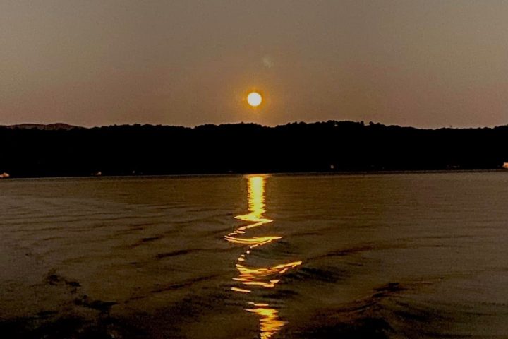 a sunset over a body of water