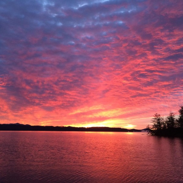 a sunset over a body of water