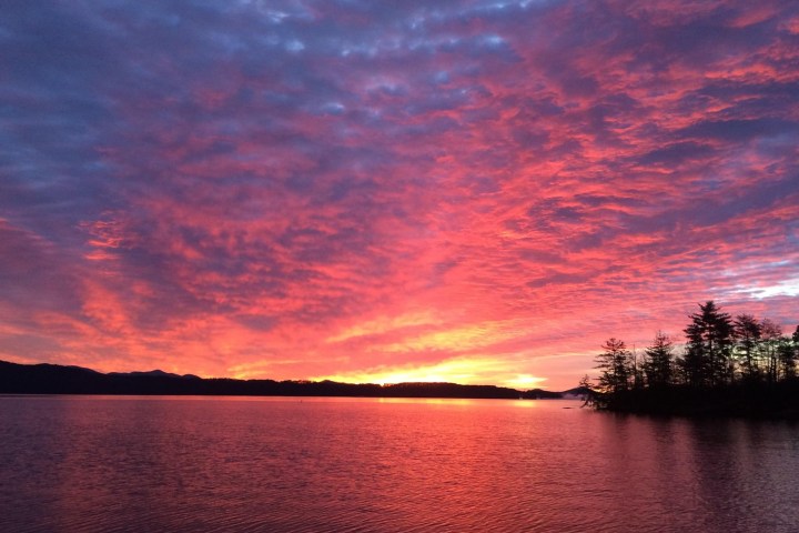 a sunset over a body of water