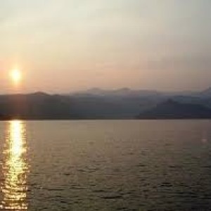 a sunset over a body of water