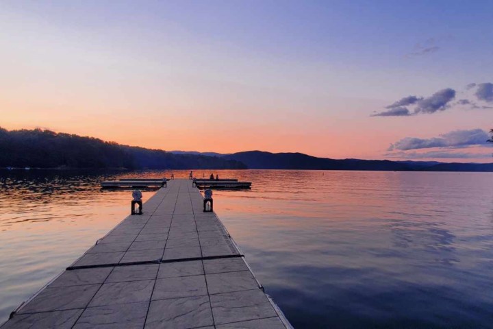 a sunset over a body of water