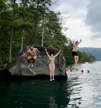 a group of people swimming in the water