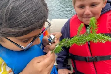 a little boy looking at the camera