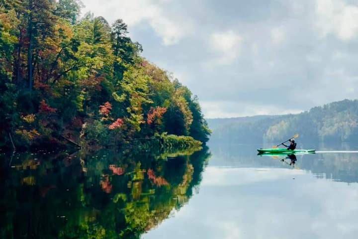a airplane that is driving down the river