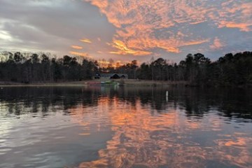 a sunset over a body of water