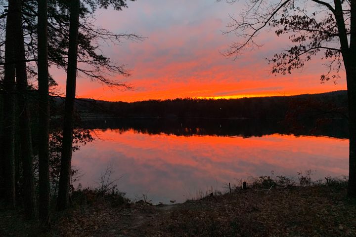 a sunset over a body of water