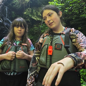 a group of people posing for the camera