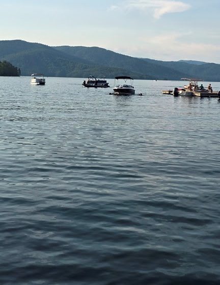 a boat floating on a body of water