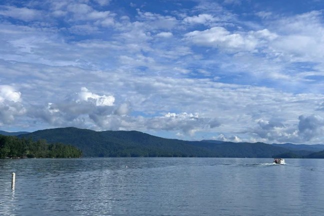 a small boat in a large body of water