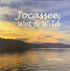 Lake Jocassee at sunset with text 'Jocassee, Wet & Wild' and 'Kay Wade' on cover.